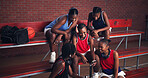 Sports, athlete and group with mobile, happy and watching game on social media, streaming and break. Basketball player, team and black women with smartphone for videos, laughing and browsing on web