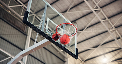 Buy stock photo Basketball, net and goal for game, court and points for competition, sports and motion for achievement. Low angle, action and win for match, hoop and successful target in university, stadium or event