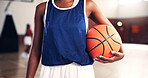 Hands, athlete or woman with basketball for sports, fitness, and confidence at gym for competition. Girl, court or player in practice with talent or hobby for contest, workout challenge and exercise