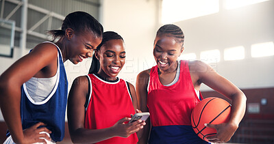 Buy stock photo Phone, friends and smile with women on basketball court for game plan, team training schedule and sports. Connection, athlete league results and app with people in gym for fitness and social media