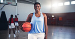 Confident, smile or black woman with basketball for sports, fitness or portrait at college gym. Girl, university or happy African player on court in practice for match, workout challenge or exercise