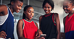 Sports, group and girls with smartphone, break and watching game on social media, team or basketball. Fitness, player and black people with mobile for videos, smile or scroll on web for entertainment