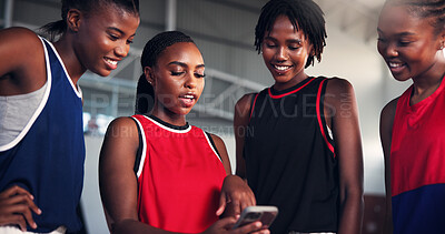 Buy stock photo Sports, group and girls with smartphone, break and watching game on social media, team or basketball. Fitness, player and black people with mobile for videos, smile or scroll on web for entertainment