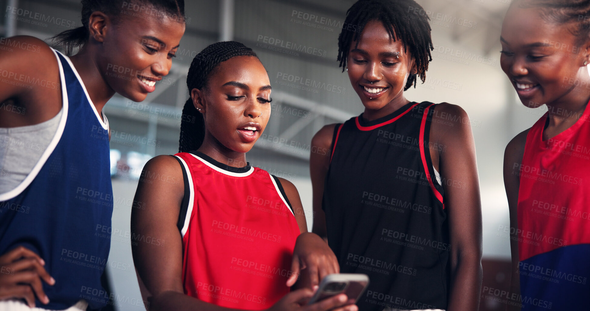 Buy stock photo Sports, group and girls with smartphone, break and watching game on social media, team or basketball. Fitness, player and black people with mobile for videos, smile or scroll on web for entertainment