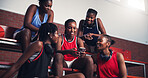 Sports, athlete and group with mobile, smile and watching game on social media, streaming or break. Basketball player, team and black women with smartphone for videos, fitness and browsing on website