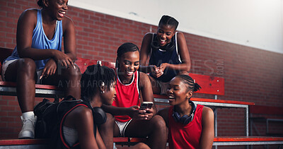 Buy stock photo Sports, athlete and group with mobile, laughing and watching game on social media, streaming and break. Basketball player, team and black women with smartphone for videos, fitness and browsing on web