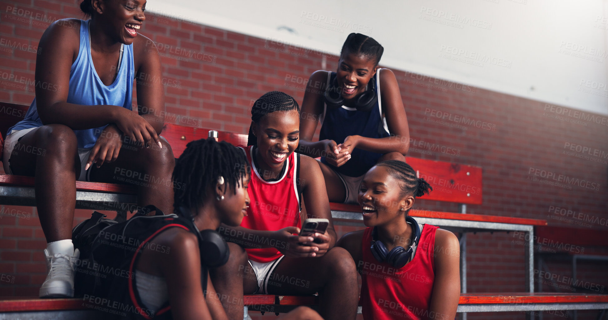 Buy stock photo Sports, athlete and group with mobile, laughing and watching game on social media, streaming and break. Basketball player, team and black women with smartphone for videos, fitness and browsing on web