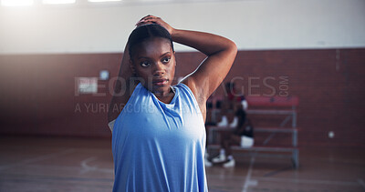 Buy stock photo Basketball, exercise and woman with stretching on court for match warm up, tournament practice and training. Sport, player and arm preparation for game performance and getting ready for competition