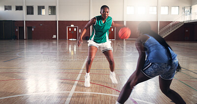 Buy stock photo Women, basketball and attack with ball on court for sport, fitness or competition on playground. Black people, players or opponent ready with defense or tackle for game, match or block at indoor gym