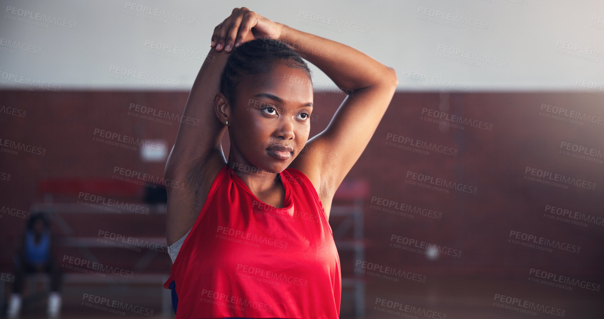 Buy stock photo Basketball, exercise and woman with stretching on court for match preparation, tournament workout and sport game. Space, player and arm warm up for performance fitness and getting ready for practice