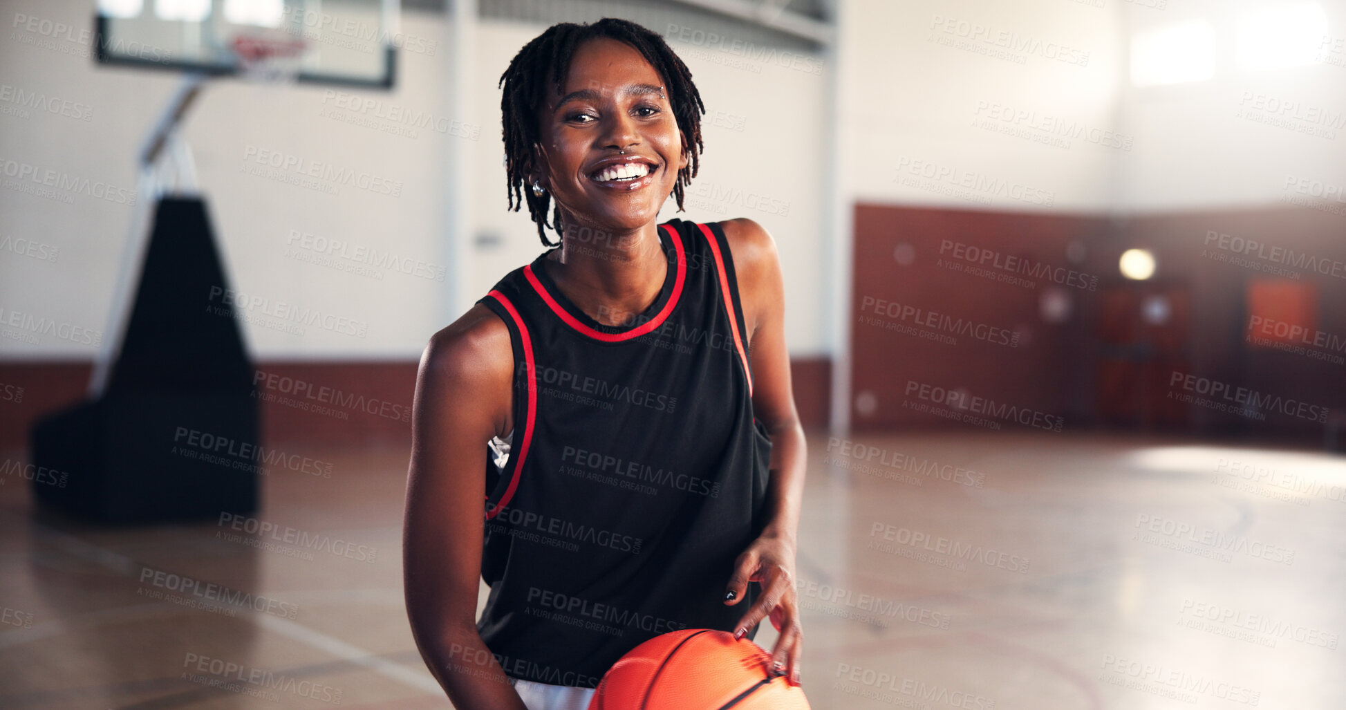 Buy stock photo Woman, basketball player and sports in portrait at gym for game, smile and training for competition. African girl, start and happy with pride for contest, workout and exercise at club in Kenya
