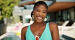 Hotel, travel and portrait of black woman at pool party for spring break, vacation and smile. Happiness, relax and holiday trip with person at villa resort for hospitality, festival and luxury