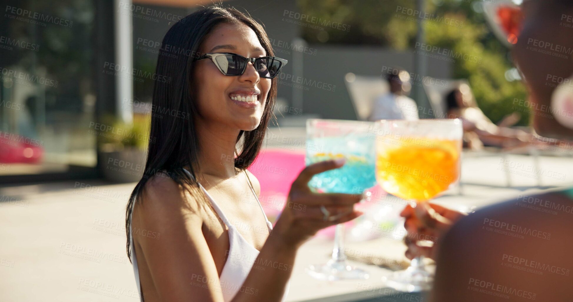 Buy stock photo Cocktail, toast and happy women at resort for summer holiday or vacation. Travel, alcohol and cheers with drink of friends for outdoor luxury, hotel hospitality and break to relax, celebrate or chill