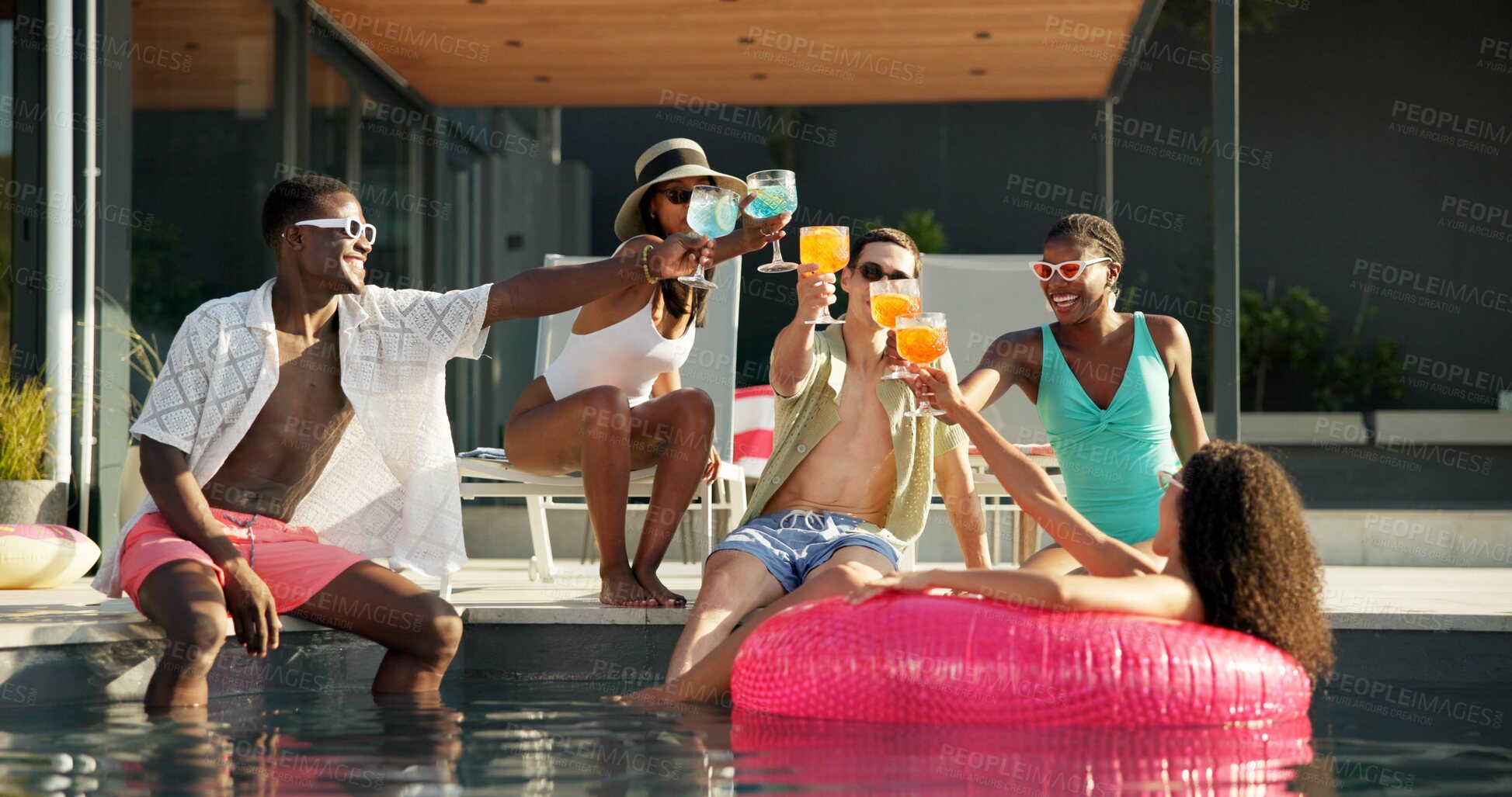 Buy stock photo Friends, cocktails and vacation toast in swimming pool with happy people, outdoor for celebration or party. Travel, accommodation and group with drinks for fun, bonding and holiday cheers in Florida