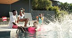 Water splash, group and fun for friends, pool and tourists on vacation, resort and getaway for reunion. Outdoor, swimming and people with smile on holiday, hangout and bonding on trip with shades