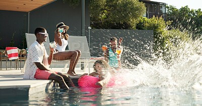 Buy stock photo Water splash, group and fun for friends, pool and party on vacation, resort and getaway for reunion. Outdoor, swimming and people with smile on holiday, hangout and bonding on trip with drinks