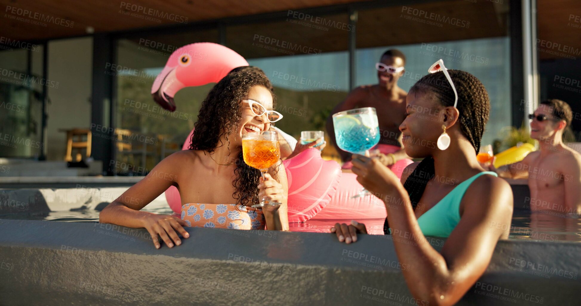 Buy stock photo Cocktail, friends and happy women by pool for summer holiday or vacation. Laugh, alcohol and talk with drink at party for outdoor luxury, hotel or resort on break to relax, celebrate or chill