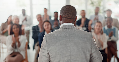 Buy stock photo Presentation, speaker and back of man with business people in office for conference, training and meeting. Corporate manager, discussion and workers in workshop, convention and seminar for finance