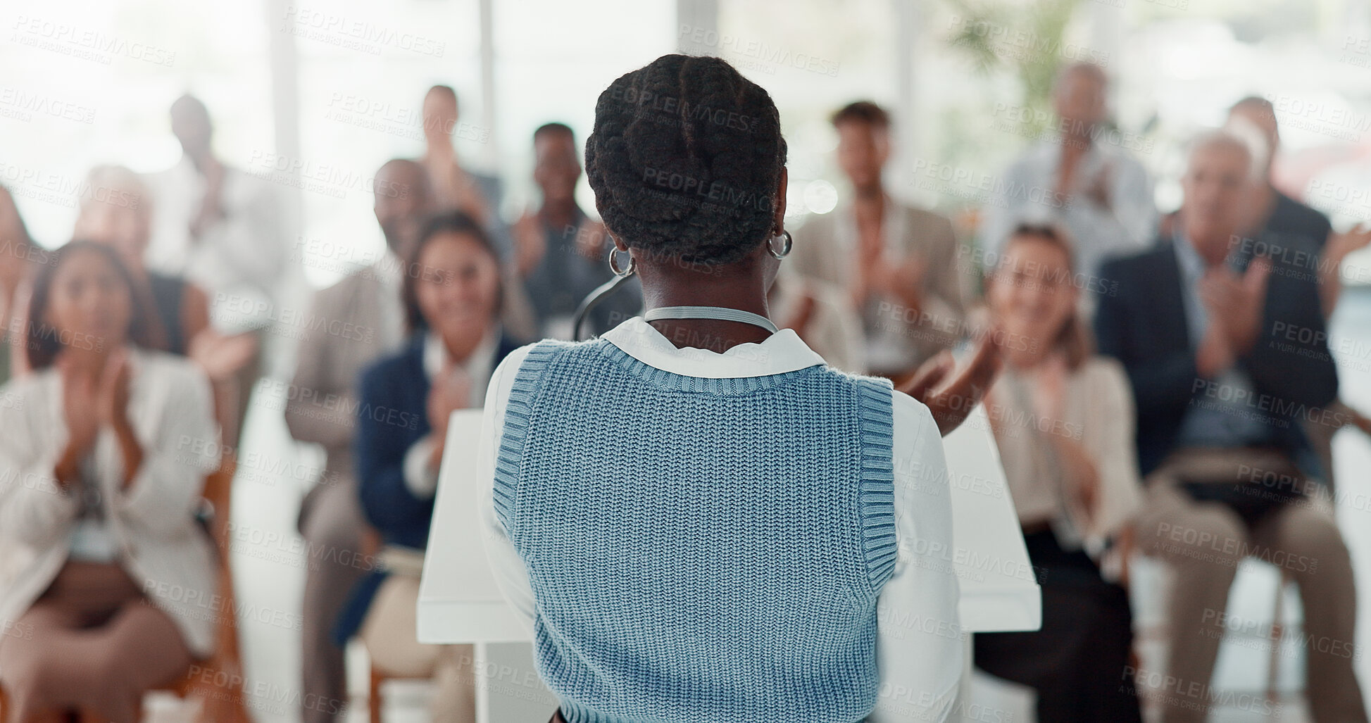Buy stock photo Presentation, speaker and back of woman with business people in office for conference, training and meeting. Corporate manager, discussion and workers in workshop, convention and seminar for coaching