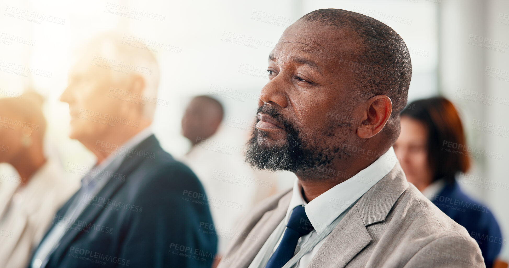 Buy stock photo Seminar, audience and man listening to business conference with employees or team in crowd. Event, feedback and group of people in meeting, presentation or training for corporate career at company