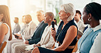 Seminar, woman and mic with question for business, opinion or employee engagement in meeting. Audience, corporate training or person in conference with discussion, feedback or speech to voice concern