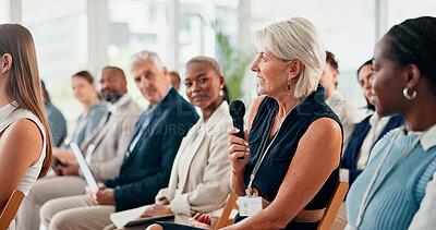 Buy stock photo Audience, woman and mic with question for business, opinion or employee engagement in conference. Group, corporate training or person in seminar with discussion, feedback or speech to voice concern