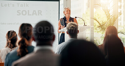 Buy stock photo Sustainability, business and woman with solar award, presentation and success for innovation project. People, employee and celebration with support, audience and renewable energy with happy speaker
