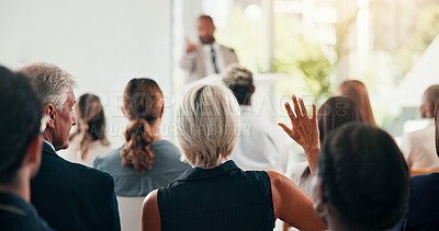 Buy stock photo Presentation, question and speaker with business people in office for conference, training and meeting. Corporate, answer and workers with hands raised in discussion, convention and finance seminar