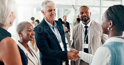 Buy stock photo Conference, handshake and networking with business people at event for global forum, investor summit and meeting. Welcome, b2b convention and expo with employees in lobby for brand exposure seminar