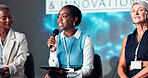 Business women, speaker and microphone for seminar, presentation and audience for conference or convention. People, tablet and question for affirmative action trade show, event or innovation workshop