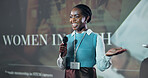 Business, speech and happy black woman at conference with mic for motivation at tech seminar. Keynote speaker, convention and presentation at event for advice, empowerment or equality with programmer