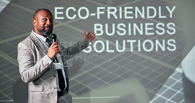 Buy stock photo Business, black man and conference for climate change, presentation and microphone with speaker. Public speaking, expert and eco friendly seminar for solution, idea pitch and education forum