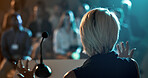 Business woman, speaker and microphone for seminar, presentation and audience for conference or convention. Female person, back and podium for international trade show, event or training workshop