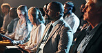 Business people, audience and man with tablet at convention for career expo, finance speech and diversity. Crowd, group and listening at international event for financial development and presentation