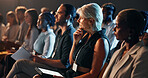 Tablet, crowd and business people at conference, workshop or seminar for finance trading. Technology, audience and mature female manager at fintech convention for financial training and network.
