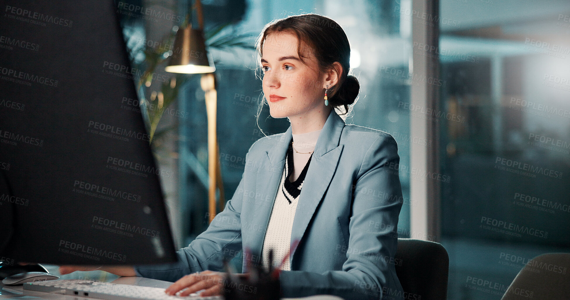 Buy stock photo Night, business and woman with computer, online reading and internet with email for funding application. Accountant, evening and employee in office, financial advisor and accounting with deadline