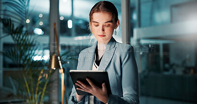 Buy stock photo Night, reading or businessman with tablet, review and news for research and funding approval. Bookkeeping, auditor and female financial advisor in office for accounting deadline and late overtime