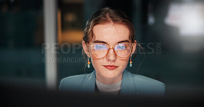 Buy stock photo Glasses, reading or businesswoman with computer, review or news for accounting deadline or funding solution. Bookkeeping, finance or financial advisor on technology in night for research or overtime