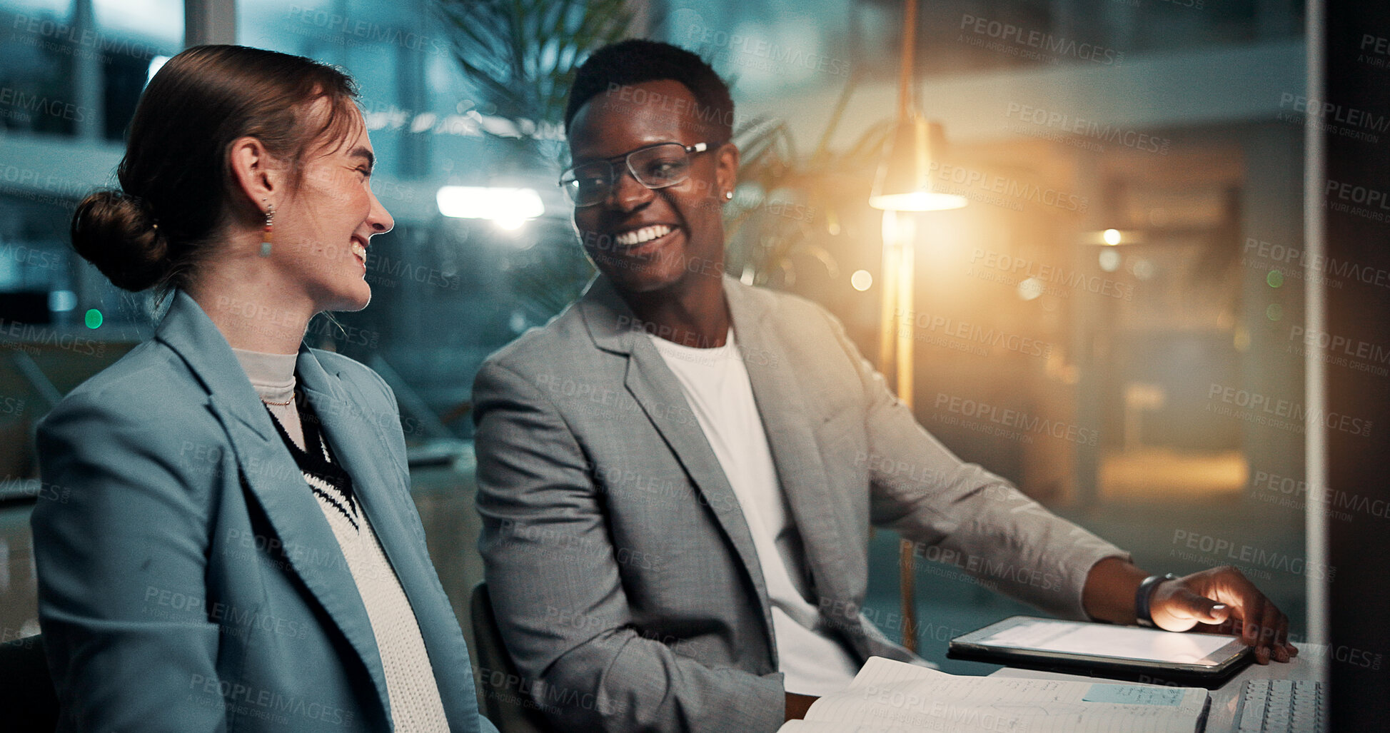 Buy stock photo Business people, tablet and idea in meeting at night for deadline, progress update or project management. Happy team, planning or brainstorming with tech in office for budget, schedule or development