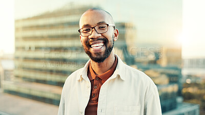 Buy stock photo Man, portrait or happy in city for business, about us or opportunity for urban development. African investor, glasses or smile at buildings outdoor for vision in community improvement in Kenya