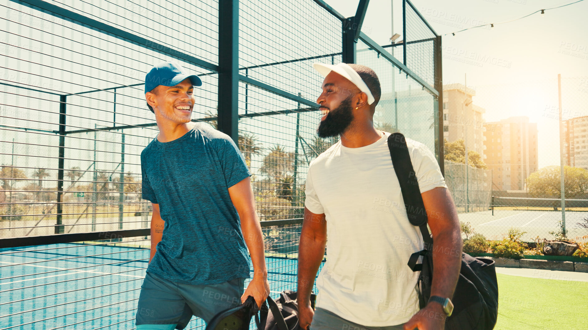 Buy stock photo Tennis friends, men and walking to court for match practice, fitness conversation and tournament game. Sport athlete, people and happy outdoor for padel competition, discussion and training exercise