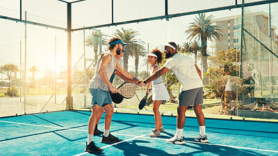 Buy stock photo People, tennis and sport with hands together for fitness match or game time on outdoor court. Group, huddle or padel players piling with stack in unity for solidarity, support or teamwork at start