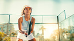 Fitness, woman and playing with padel racket, outdoor and practice for match in morning or training. Active, athlete and person with equipment for sports, performance and warm up for game and skils