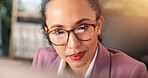 Computer, finance and reading with business woman at desk for investment or portfolio management. Agenda, glasses and information with stock market broker in workplace for strategy development