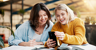 Buy stock photo People, students and laugh with phone in library for social media, university gossip or reading meme. Friends, mobile and streaming for funny video, education schedule and learning website at college