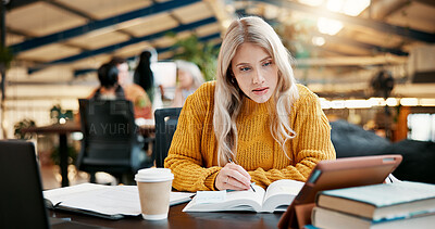 Buy stock photo Library, tablet and woman learning in university while reading textbook, knowledge or writing notes for research. Technology, college and serious student study for exam, education or test preparation