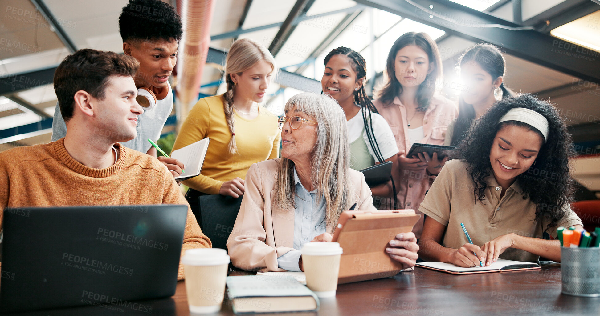 Buy stock photo Education, students and lecturer with tablet, talking and info for assignment in classroom and group. Happy, teacher and mature woman with advice for project, people and notes with tech in university