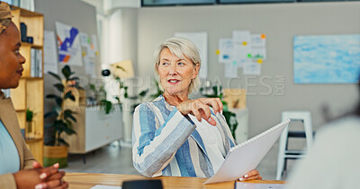 Buy stock photo Discussion, documents and business woman in meeting for campaign manager, branding report and research. Feedback results, review and brainstorming with mature employee in office for creative startup