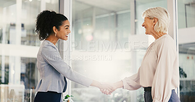 Buy stock photo Shaking hands, deal and business women in office with greeting for job interview with contract. Negotiation, partnership and female hr manager with candidate for thank you handshake in workplace.