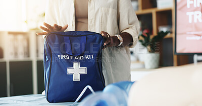 Buy stock photo Hands, woman and bag for first aid training for rescue safety, demonstration lesson and advice. Person, explaining and medical kit in office for emergency injury, learning and process for life saving